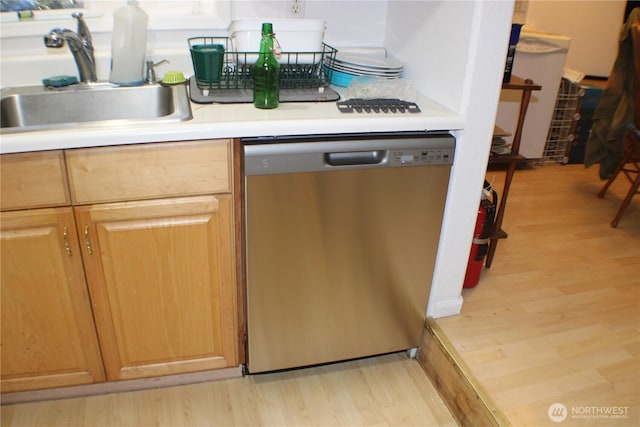 33 N Dow Mountain Pl, Hoodsport, WA 98548 - kitchen with stainless steel dishwasher, light wood-style flooring, and light countertops