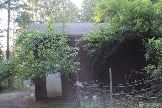 33 N Dow Mountain Pl, Hoodsport, WA 98548 - view of home's exterior featuring a shingled roof
