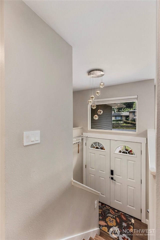 22625 1st Dr SE, Bothell, WA 98021 - foyer entrance featuring wood finished floors