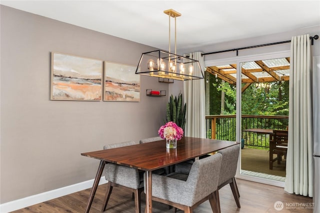 22625 1st Dr SE, Bothell, WA 98021 - dining area featuring a chandelier and wood finished floors