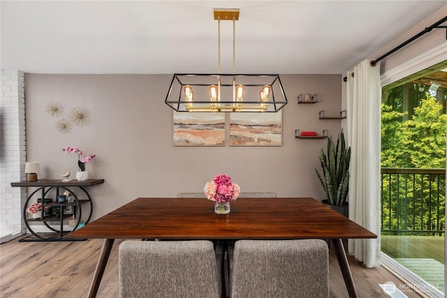 22625 1st Dr SE, Bothell, WA 98021 - dining area with wood finished floors and a chandelier
