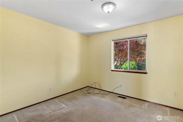 2338 Grand Ave, East Wenatchee, WA 98802 - empty room featuring carpet floors and baseboards