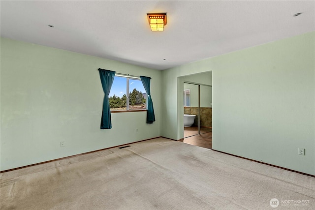 2338 Grand Ave, East Wenatchee, WA 98802 - unfurnished bedroom with carpet and connected bathroom