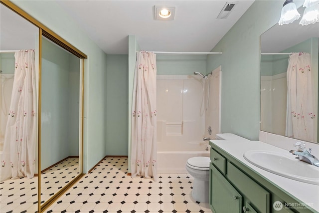 2338 Grand Ave, East Wenatchee, WA 98802 - full bathroom with vanity, tile patterned floors, and shower / bath combo with shower curtain