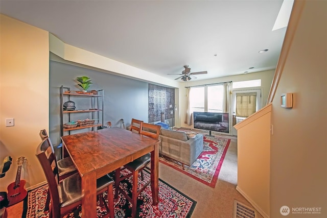 816 Cherry Ave, Sumner, WA 98390 - carpeted dining space with ceiling fan