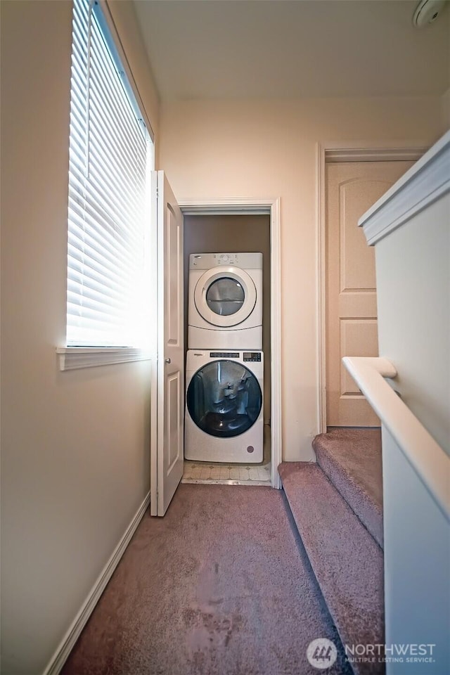 816 Cherry Ave, Sumner, WA 98390 - washroom with estacked washer and dryer, carpet, and healthy amount of natural light