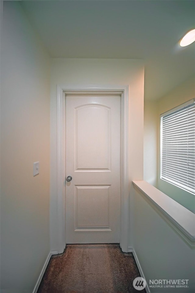 816 Cherry Ave, Sumner, WA 98390 - corridor featuring carpet floors and baseboards