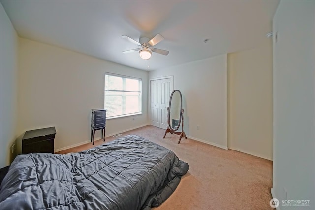 816 Cherry Ave, Sumner, WA 98390 - carpeted bedroom with a ceiling fan and a closet