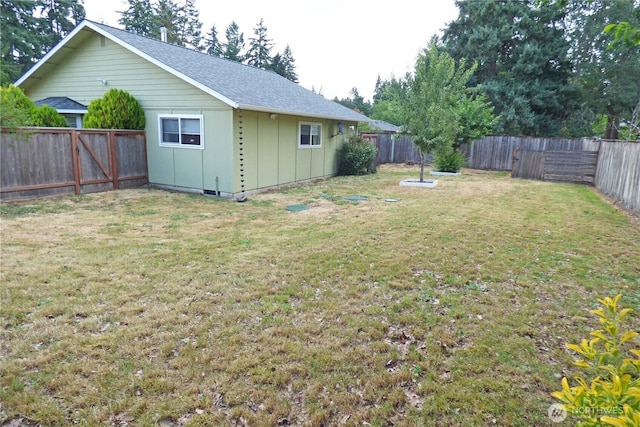 8703 Skokomish Way NE, Olympia, WA 98516 - fenced backyard with an outdoor structure