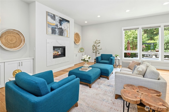 6686 NE Ralston Rd, Bainbridge Island, WA 98110 - living area featuring recessed lighting, light wood finished floors, and a fireplace