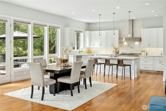 6686 NE Ralston Rd, Bainbridge Island, WA 98110 - dining space with recessed lighting and light wood-type flooring