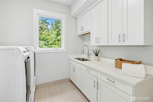 6686 NE Ralston Rd, Bainbridge Island, WA 98110 - laundry room with cabinet space and washer and dryer
