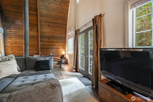 14001 Welcome Rd, Glacier, WA 98244 - living room with wood finished floors, healthy amount of natural light, wood walls, and a towering ceiling