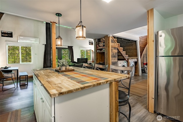 14001 Welcome Rd, Glacier, WA 98244 - kitchen featuring freestanding refrigerator, wooden counters, and dark wood-style flooring