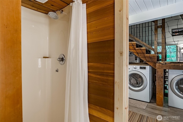 14001 Welcome Rd, Glacier, WA 98244 - laundry area featuring wood finished floors and independent washer and dryer