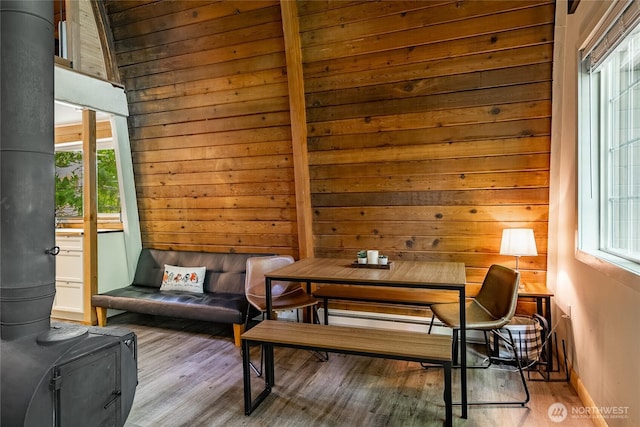 14001 Welcome Rd, Glacier, WA 98244 - living area featuring wood walls, wood finished floors, and a wood stove