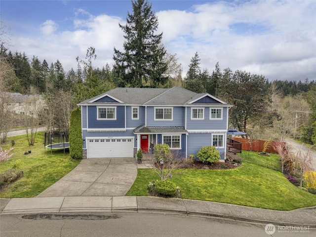 6372 Juanita Cir NE, Bremerton, WA 98311 - traditional home featuring a trampoline, a garage, and concrete driveway