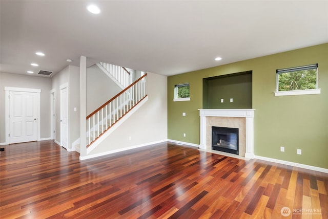 6372 Juanita Cir NE, Bremerton, WA 98311 - unfurnished living room featuring wood finished floors, stairway, recessed lighting, and a fireplace