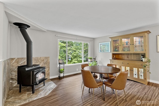 17225 429th Ave SE, North Bend, WA 98045 - dining space with a wood stove and wood finished floors