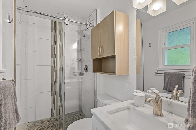 17225 429th Ave SE, North Bend, WA 98045 - full bath featuring a shower stall, vanity, and a textured wall