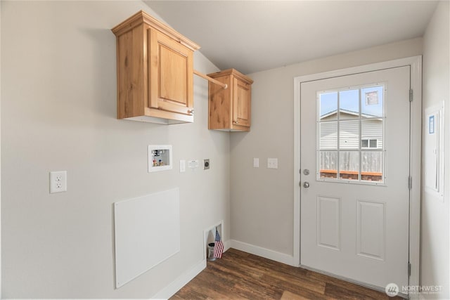 276 Canal Dr NE, Ocean Shores, WA 98569 - laundry room with hookup for an electric dryer, washer hookup, dark wood finished floors, and cabinet space