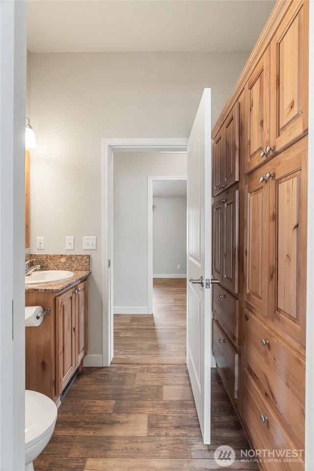 276 Canal Dr NE, Ocean Shores, WA 98569 - bathroom with vanity and wood finished floors