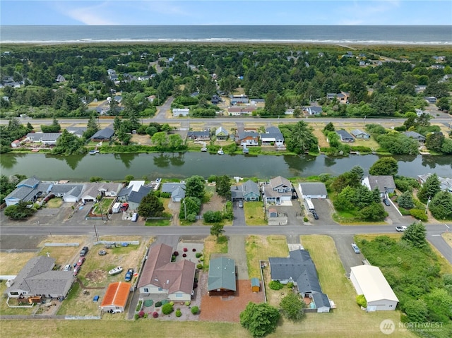276 Canal Dr NE, Ocean Shores, WA 98569 - aerial view of property's location with a nearby body of water and nearby suburban area