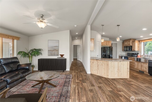 276 Canal Dr NE, Ocean Shores, WA 98569 - living area featuring dark wood-style floors, lofted ceiling, a ceiling fan, and recessed lighting