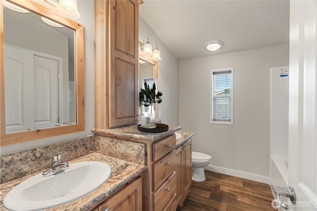 276 Canal Dr NE, Ocean Shores, WA 98569 - bathroom with vanity and wood finished floors