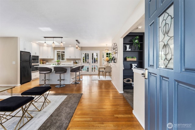14715 57th Ave S, Tukwila, WA 98168 - entryway with light wood finished floors and baseboards