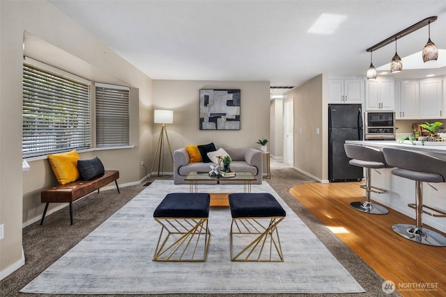 14715 57th Ave S, Tukwila, WA 98168 - living room with baseboards and light wood-style flooring