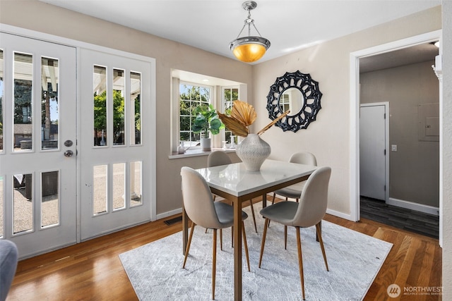 14715 57th Ave S, Tukwila, WA 98168 - dining area with wood finished floors and electric panel