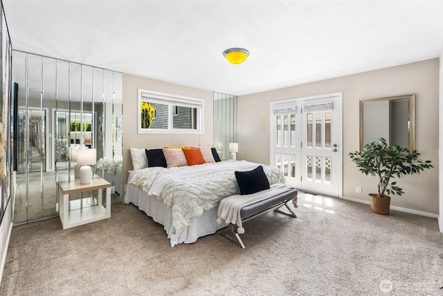 14715 57th Ave S, Tukwila, WA 98168 - carpeted bedroom with multiple windows and access to exterior