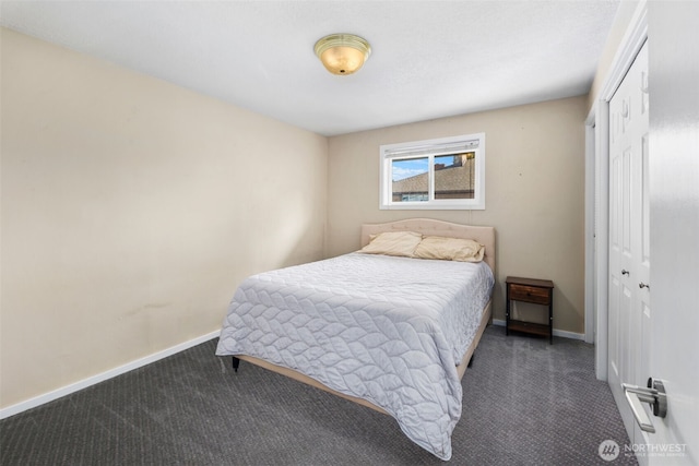 14715 57th Ave S, Tukwila, WA 98168 - carpeted bedroom with a closet and baseboards