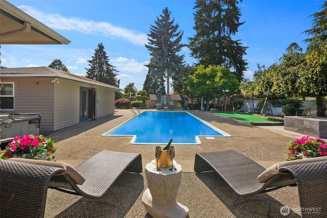 14715 57th Ave S, Tukwila, WA 98168 - view of swimming pool with a patio and a fenced backyard