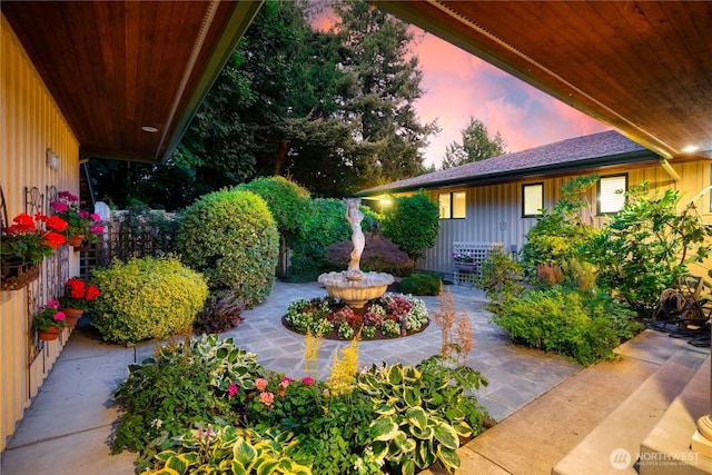 7001 Palm Ln, Anacortes, WA 98221 - yard at dusk featuring a patio area