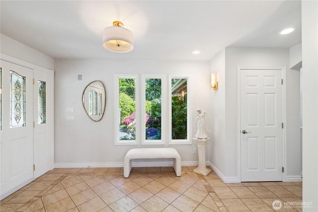 7001 Palm Ln, Anacortes, WA 98221 - entrance foyer featuring light tile patterned floors, recessed lighting, and inlaid floor details