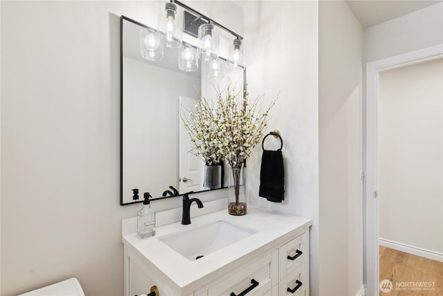 7001 Palm Ln, Anacortes, WA 98221 - bathroom with vanity and wood finished floors