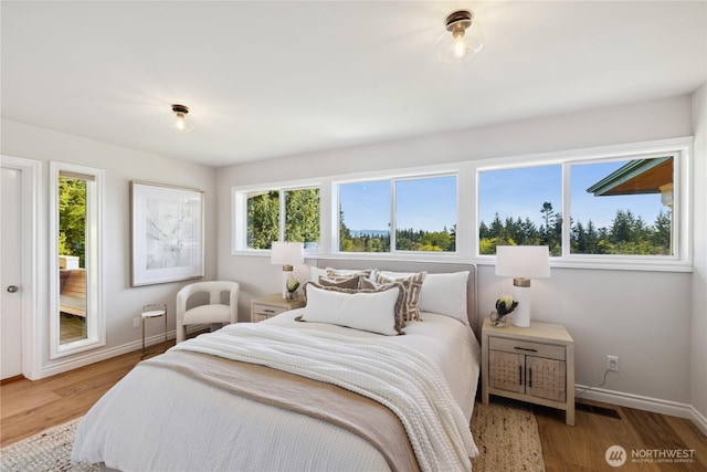 7001 Palm Ln, Anacortes, WA 98221 - bedroom with wood finished floors