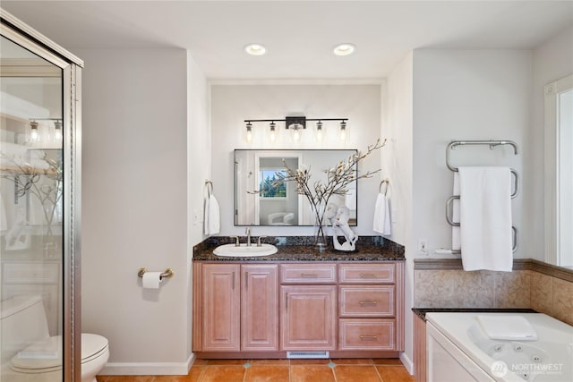 7001 Palm Ln, Anacortes, WA 98221 - bathroom with double vanity, tile patterned floors, a jetted tub, an enclosed shower, and recessed lighting