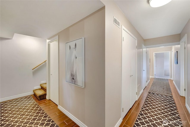 7001 Palm Ln, Anacortes, WA 98221 - hall featuring wood finished floors and stairs