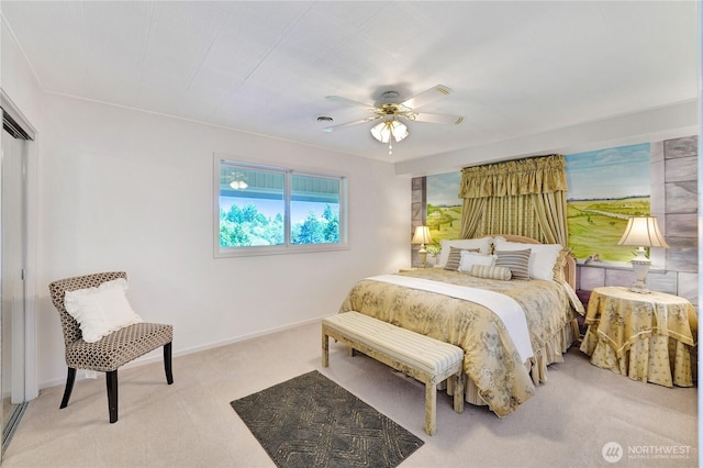 7001 Palm Ln, Anacortes, WA 98221 - carpeted bedroom with baseboards and ceiling fan