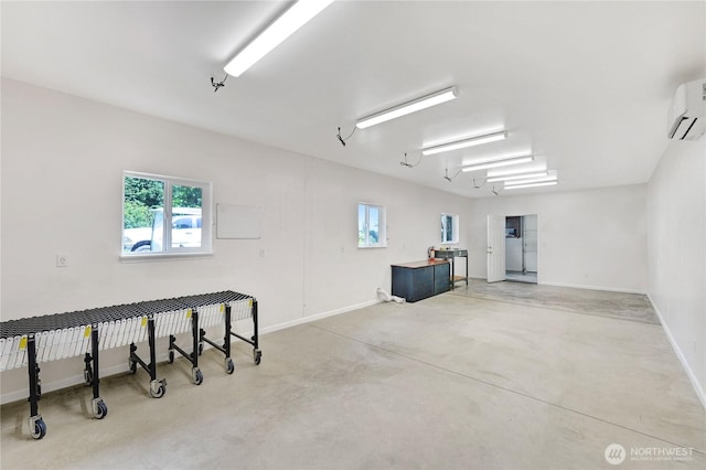 7001 Palm Ln, Anacortes, WA 98221 - garage with a wall unit AC and baseboards