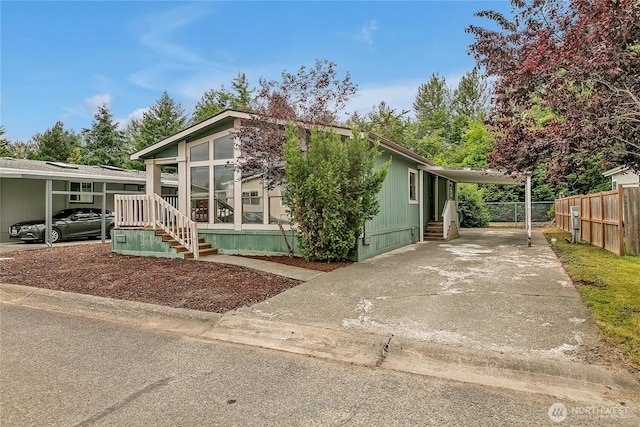 206 Noble Fir Cir, Enumclaw, WA 98022 - view of front of house featuring a carport, driveway, and entry steps