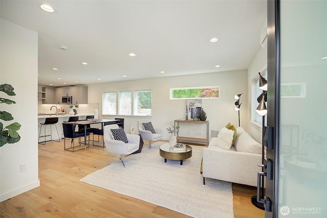 2904 W Bertona St, Seattle, WA 98199 - living room with light wood-style floors and recessed lighting