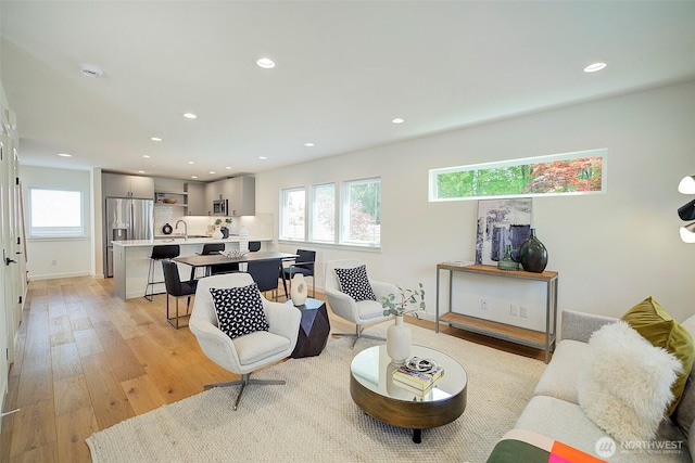 2904 W Bertona St, Seattle, WA 98199 - living room featuring light wood-type flooring and recessed lighting