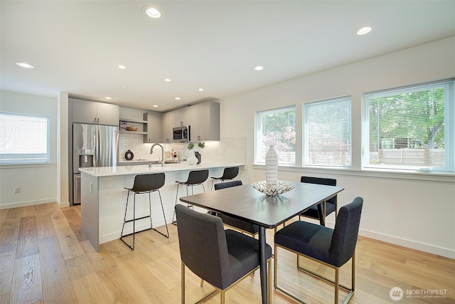 2904 W Bertona St, Seattle, WA 98199 - dining room with plenty of natural light, recessed lighting, and light wood finished floors
