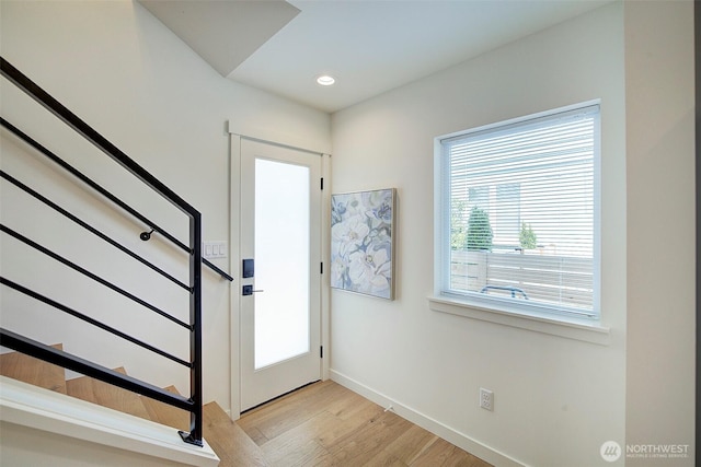 2904 W Bertona St, Seattle, WA 98199 - foyer entrance featuring stairway, light wood-style flooring, and recessed lighting