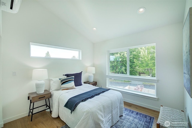 2904 W Bertona St, Seattle, WA 98199 - bedroom featuring lofted ceiling, recessed lighting, and wood finished floors