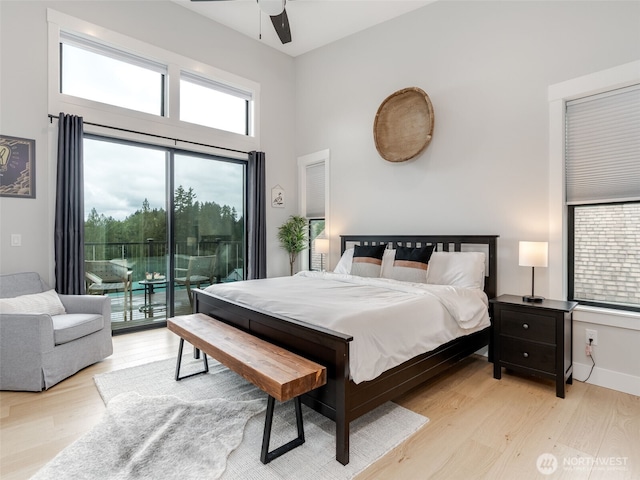 168 Lakeside Dr, Mossyrock, WA 98564 - bedroom featuring access to outside, light wood-type flooring, a towering ceiling, and ceiling fan